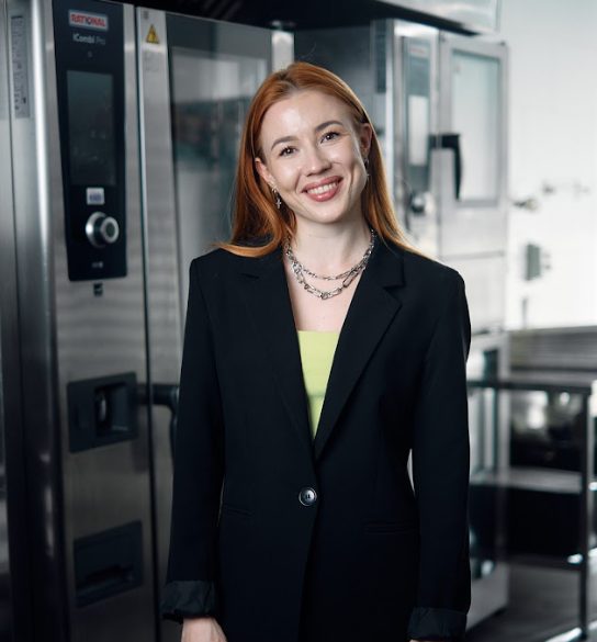 Smiling account manager in a black blazer
